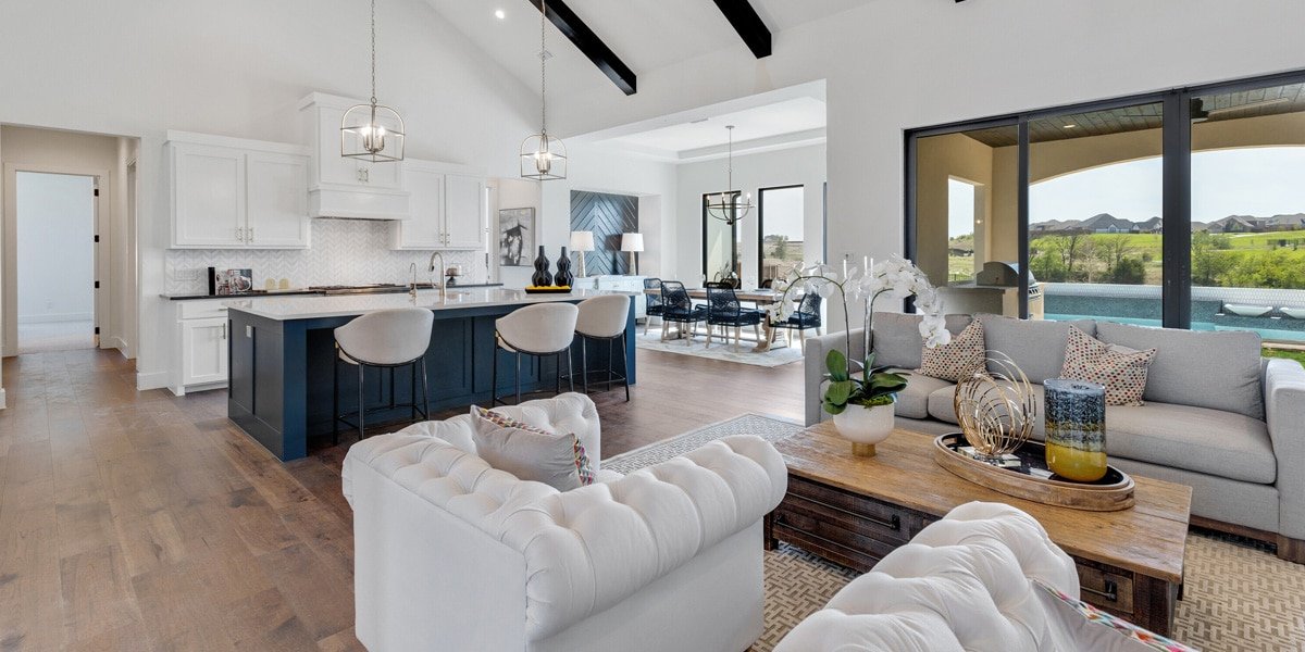 A modern open-plan kitchen and living room in The Vines.